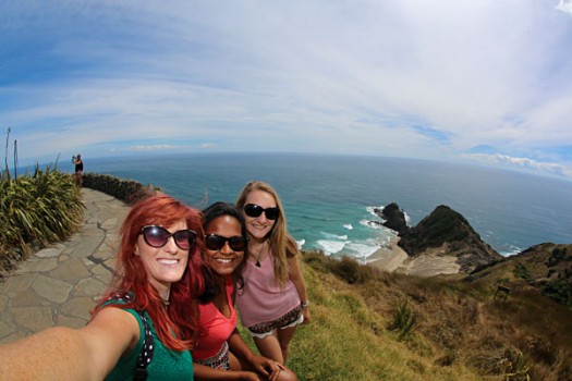 Kiwi-Experience-Friends-Selfie-at-Cape-Reinga-North-Island-New-Zealand