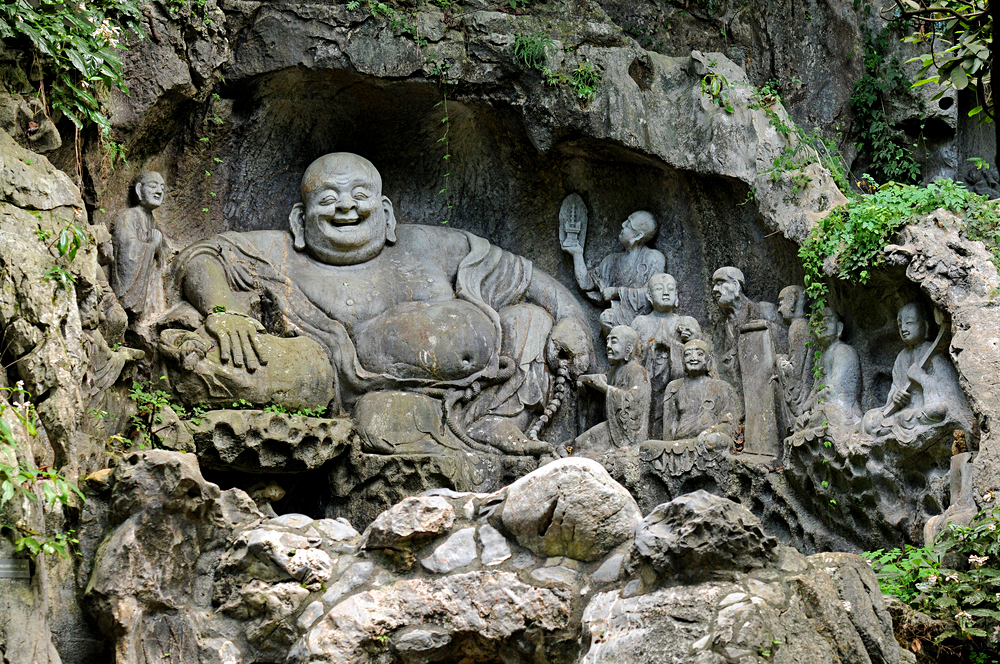 Statue of Laughing Buddha at Lingyin Temple, Hangzhou, China