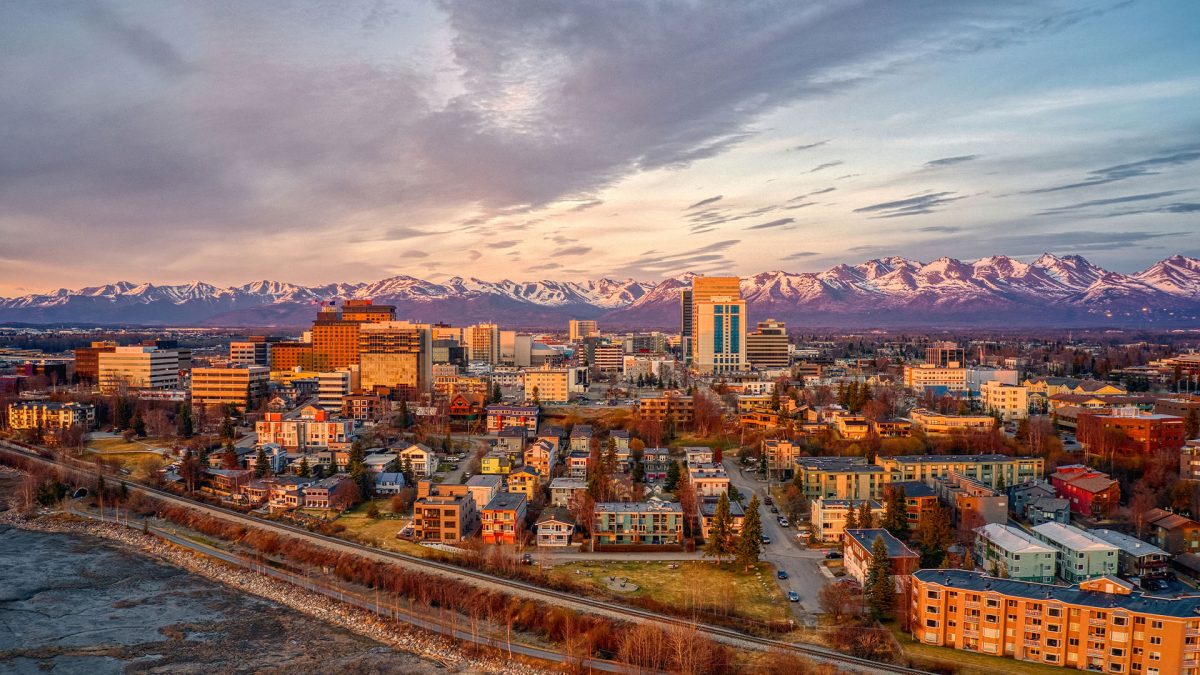 A panoramic view of the city of Anchorage, Alaska at sunset.